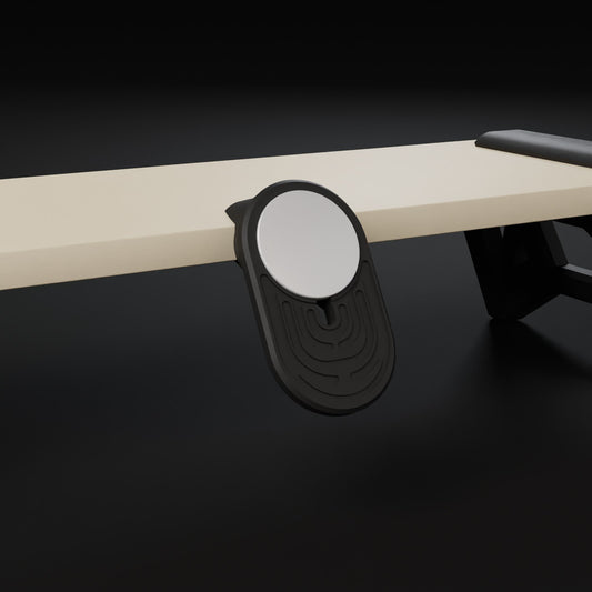 Support iki pour chargeur MagSafe accroché au riser, téléphone en charge
